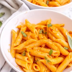 overhead image of pasta in a white bowl