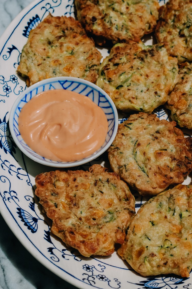 overhead image of zucchini and corn fritter.