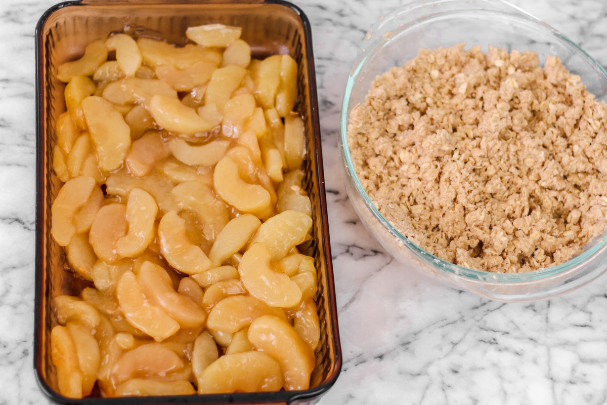 image of making apple crisp in a casserole.