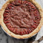 chocolate pecan pie on table