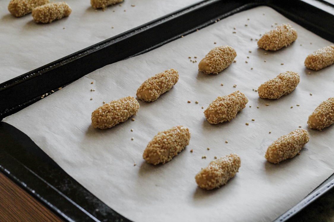 image of baking Sicilian sesame seed cookies on baking sheets