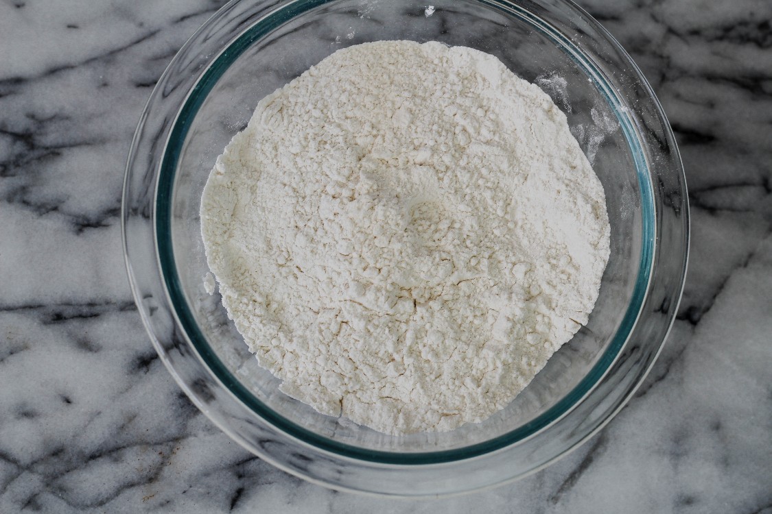 image of flour in a glass bowl 