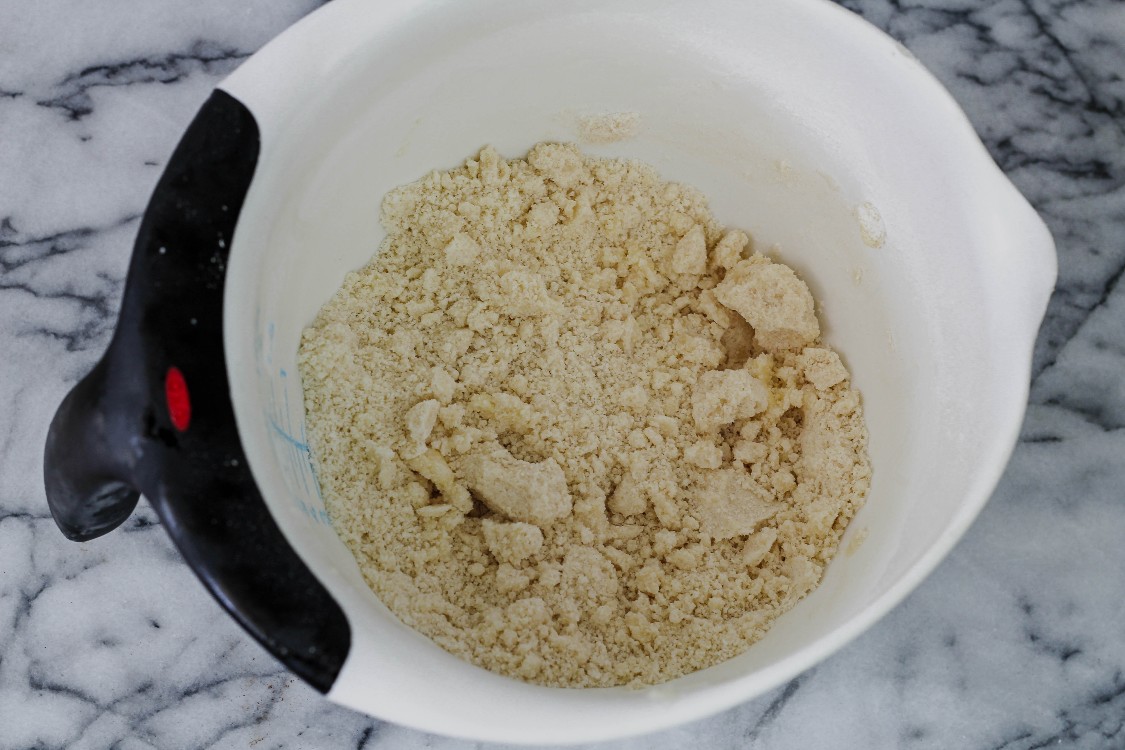 image of cookie batter in a white mixing bowl 