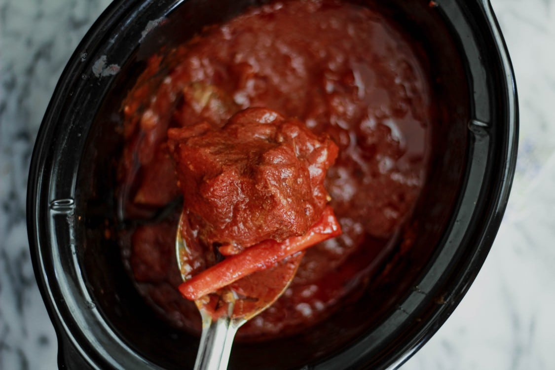 image of beef short rib sauce in a slow cooker