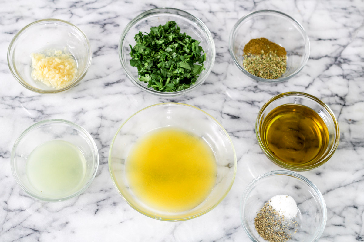image of ingredients for a marinade on a marble background