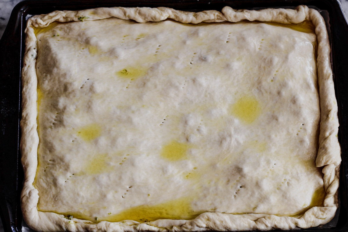image of a savory pie on a baking sheet 