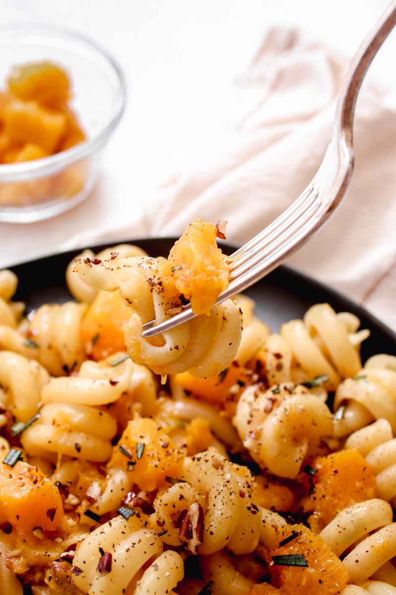 overhead image of easy vegan butternut squash pasta on a fork