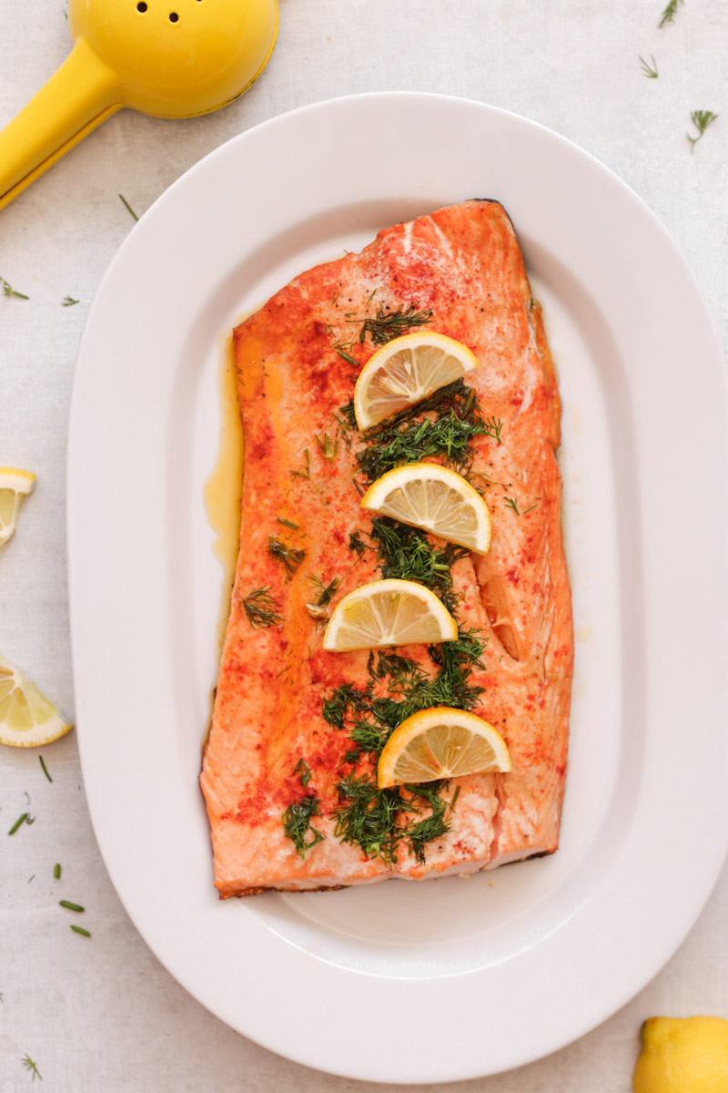 overhead image of easy baked salmon on a white dish