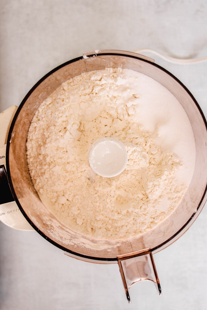 overhead image of dry ingredients in a food processor