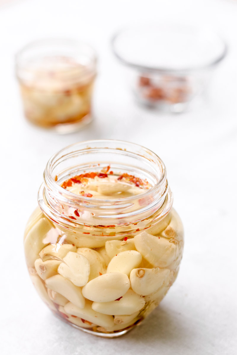 overhead image of Easy Pickled Garlic (Spicy)in glass jar