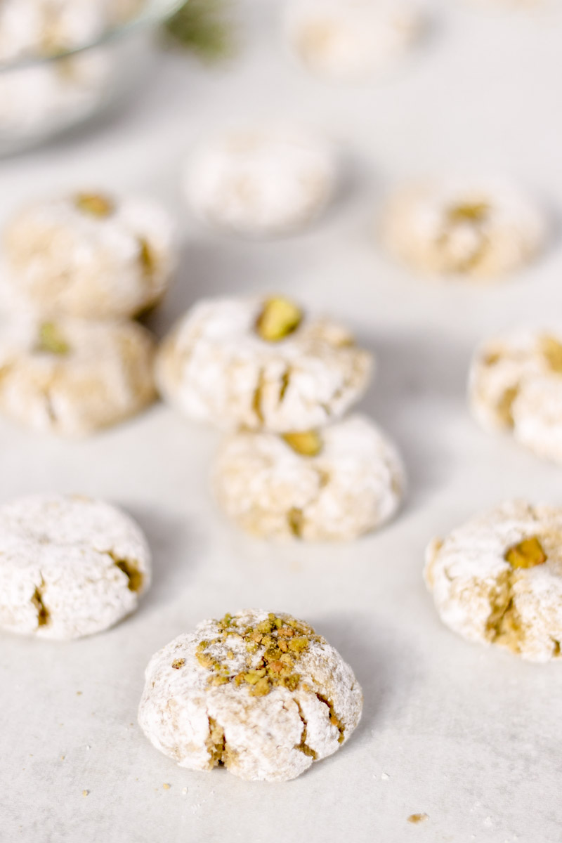 overhead image of cookies with ground pistachio on top