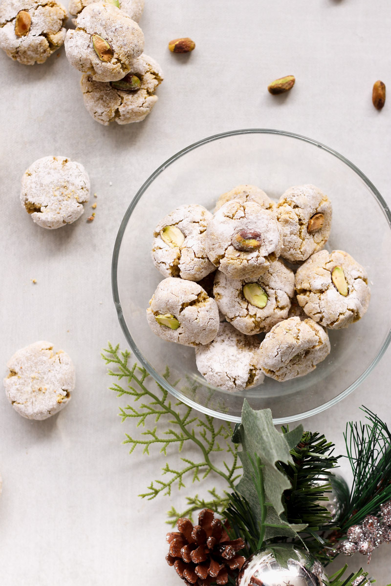 overhead image of Sicilian pistachio amaretti in a glass bowl