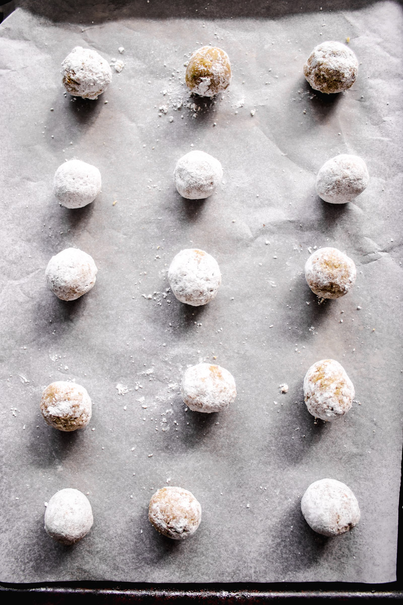 image of cookie dough balls on a baking sheet