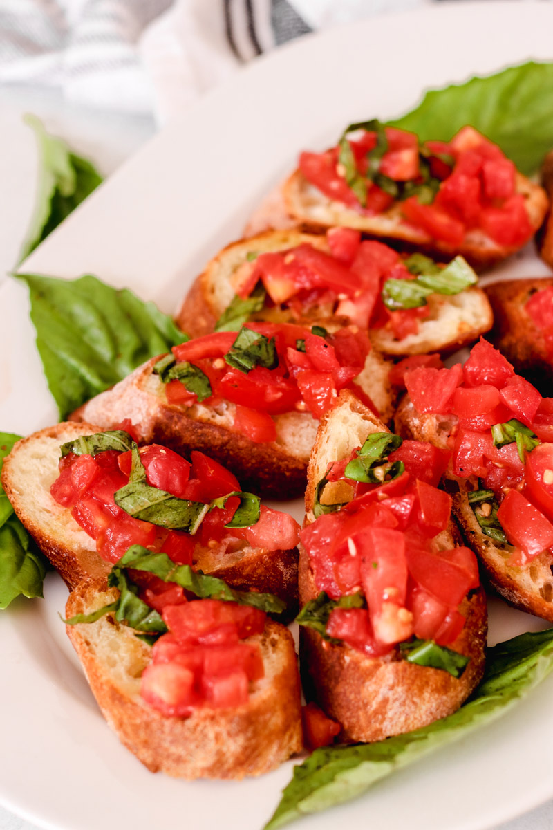 image of bread slices topped with chopped tomatoes. 