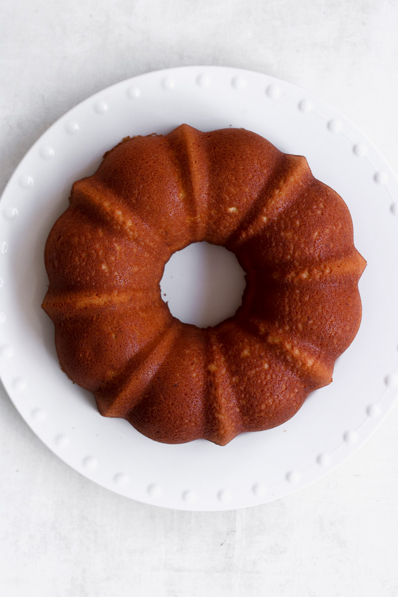 overhead image of a Bundt cake on a white plate