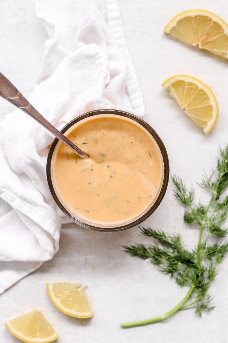 overhead image of mustard sauce in a glass bowl 