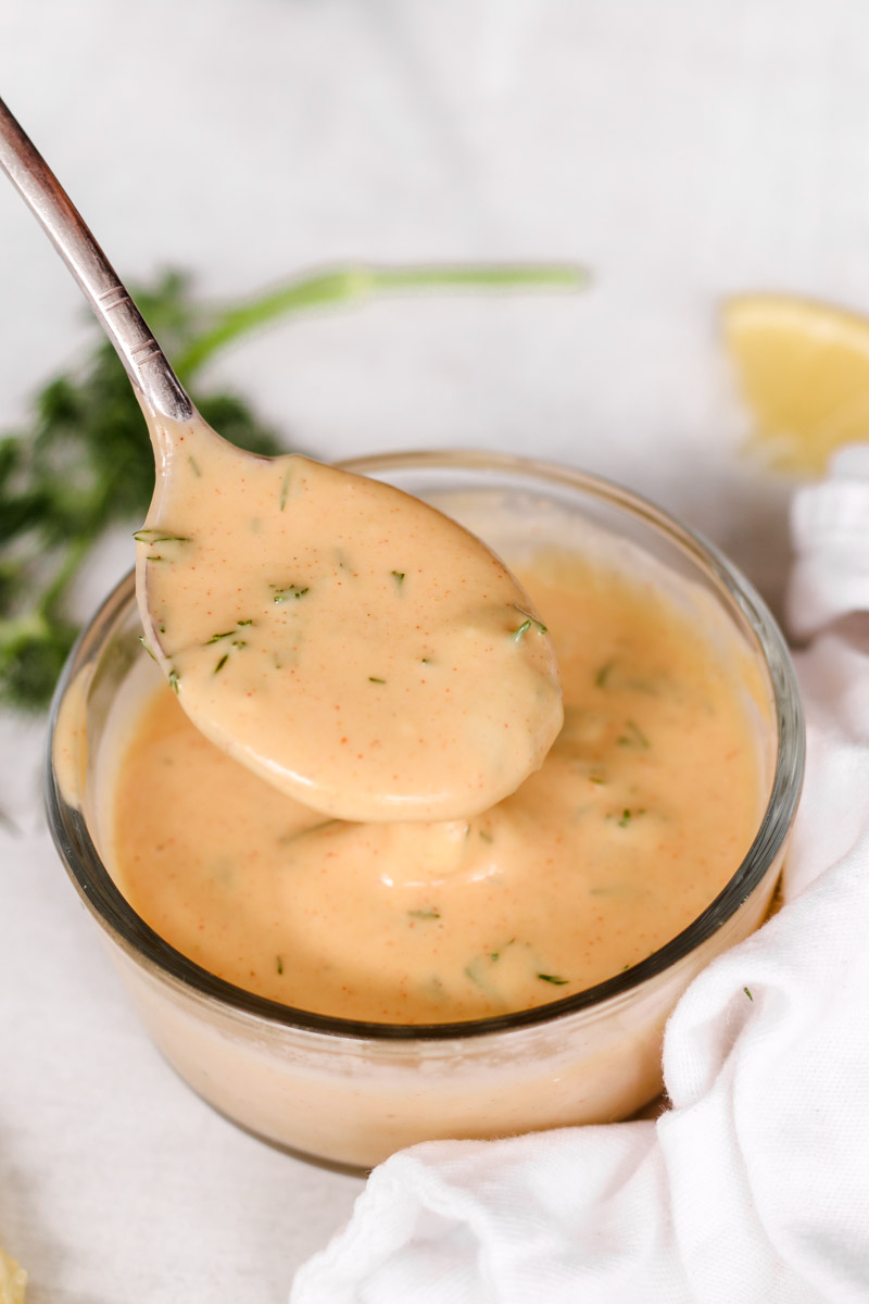 closeup  image of a sauce on a spoon 