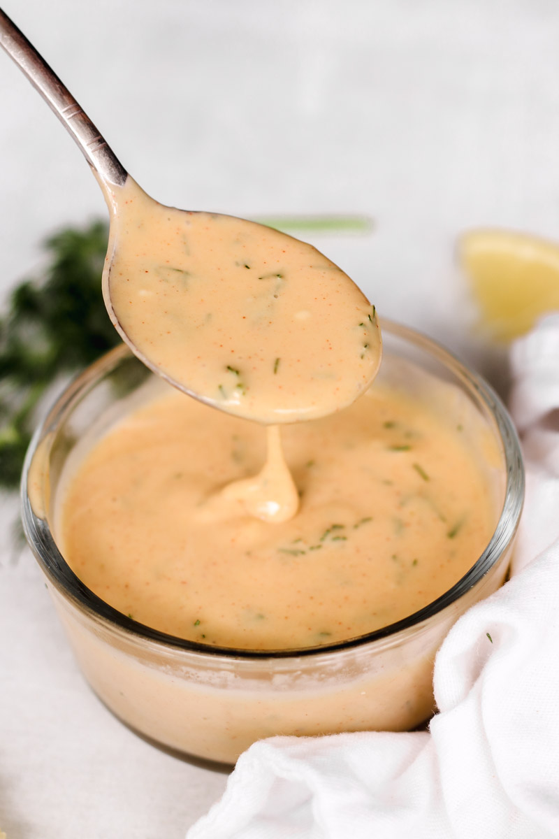 closeup image of a sauce on a spoon