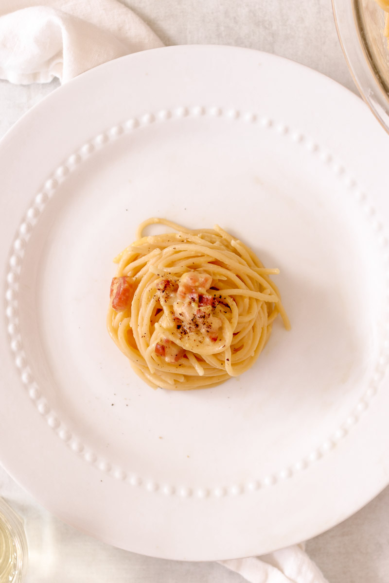 overhead image of pasta on a white dish