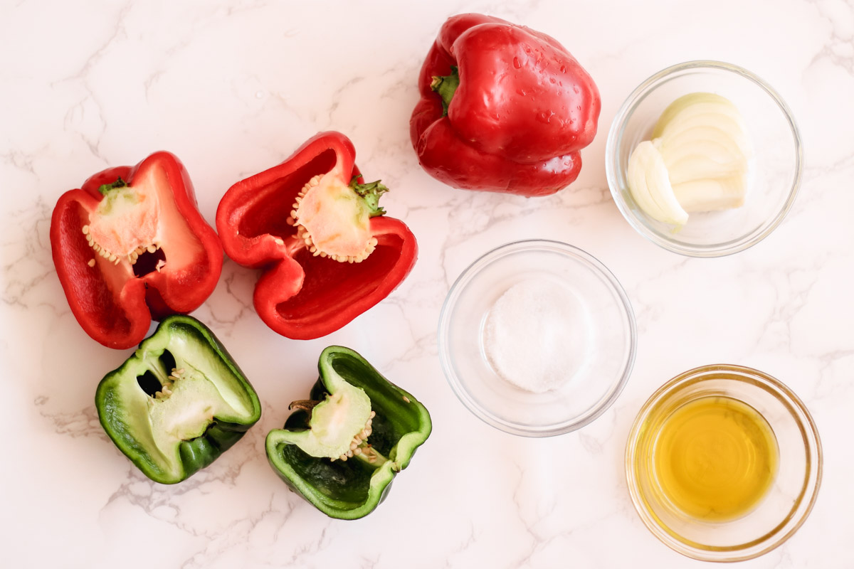 overhead image of peppers and jars of ingredients to make peperonata.