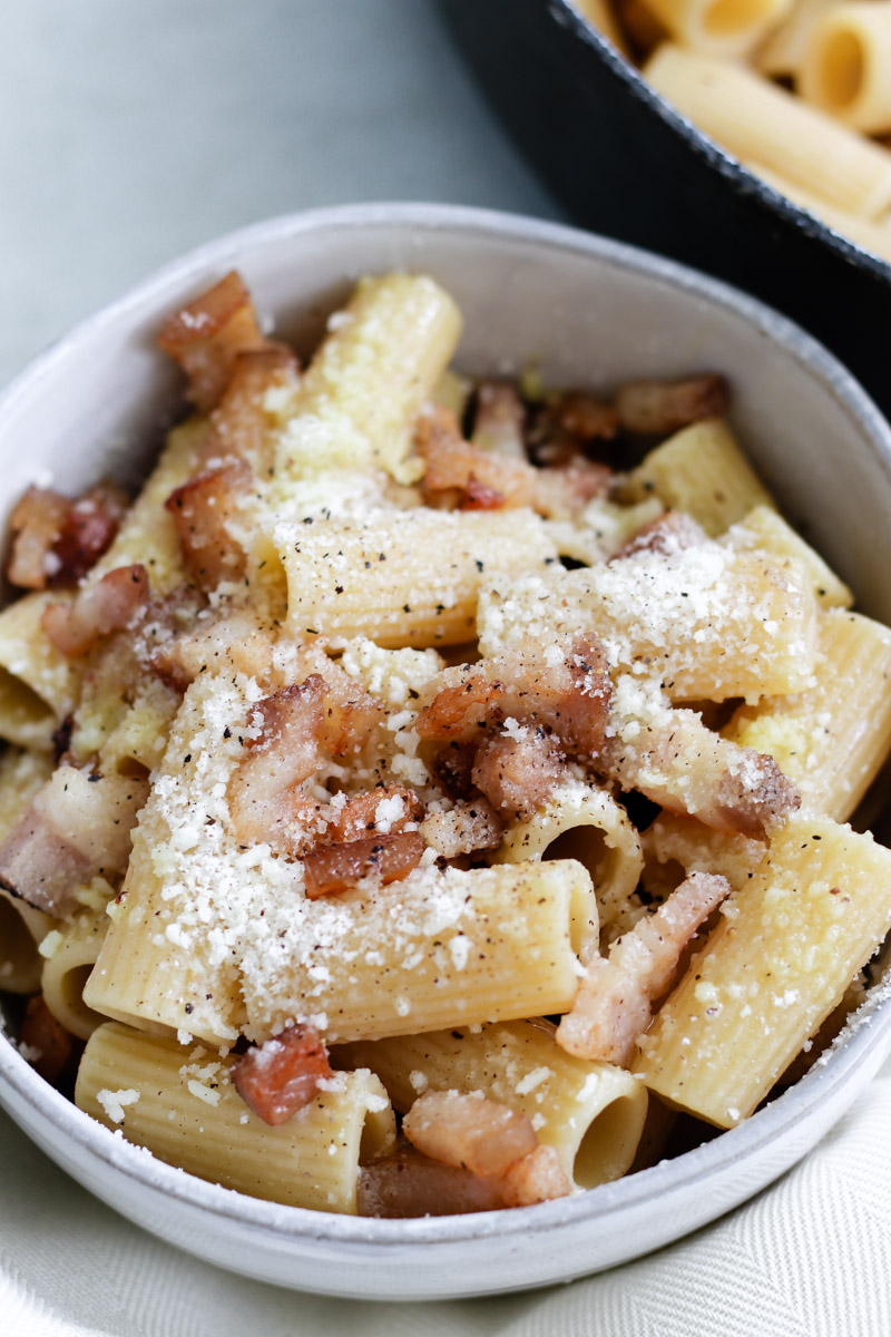 overhead image of pasta alla gricia in a bowl.