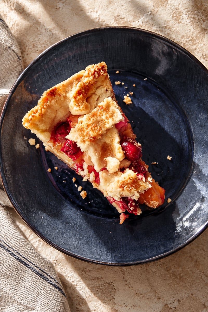 Cranberry apple pie with a golden lattice crust and sparkling sugar