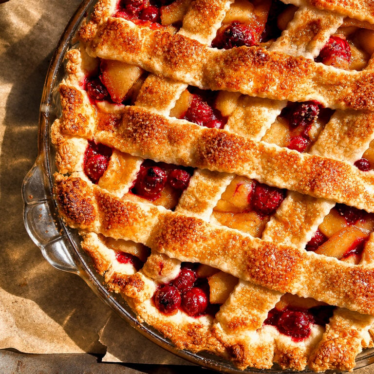 Cranberry apple pie with a golden lattice crust and sparkling sugar