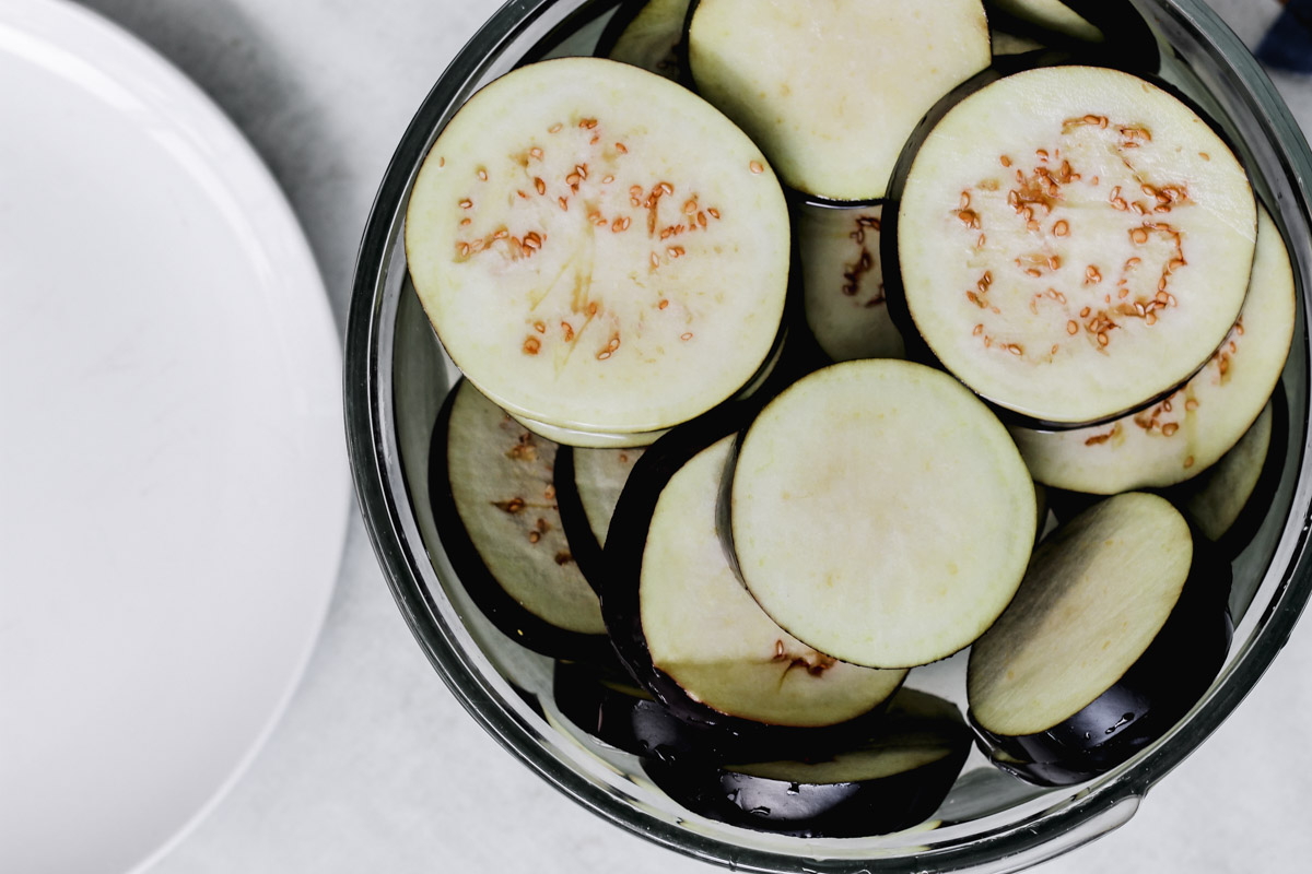 eggplants in salted water