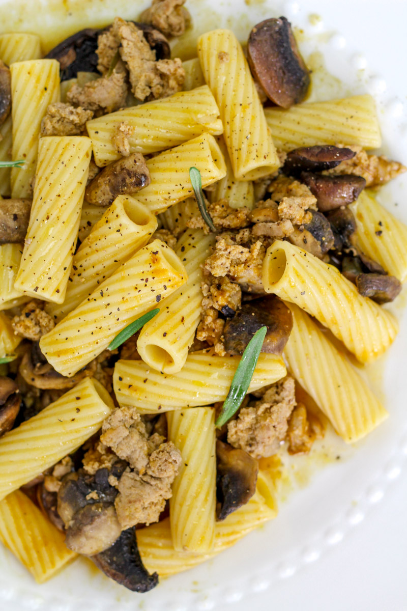 overhead image of ground turkey pasta on a white plate. 