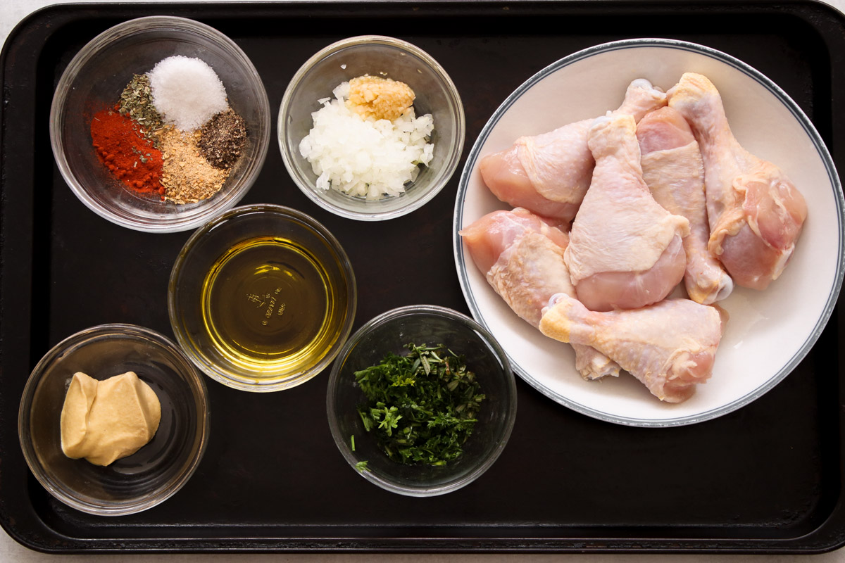 overhead image of chicken and ingredients to make baked chicken.