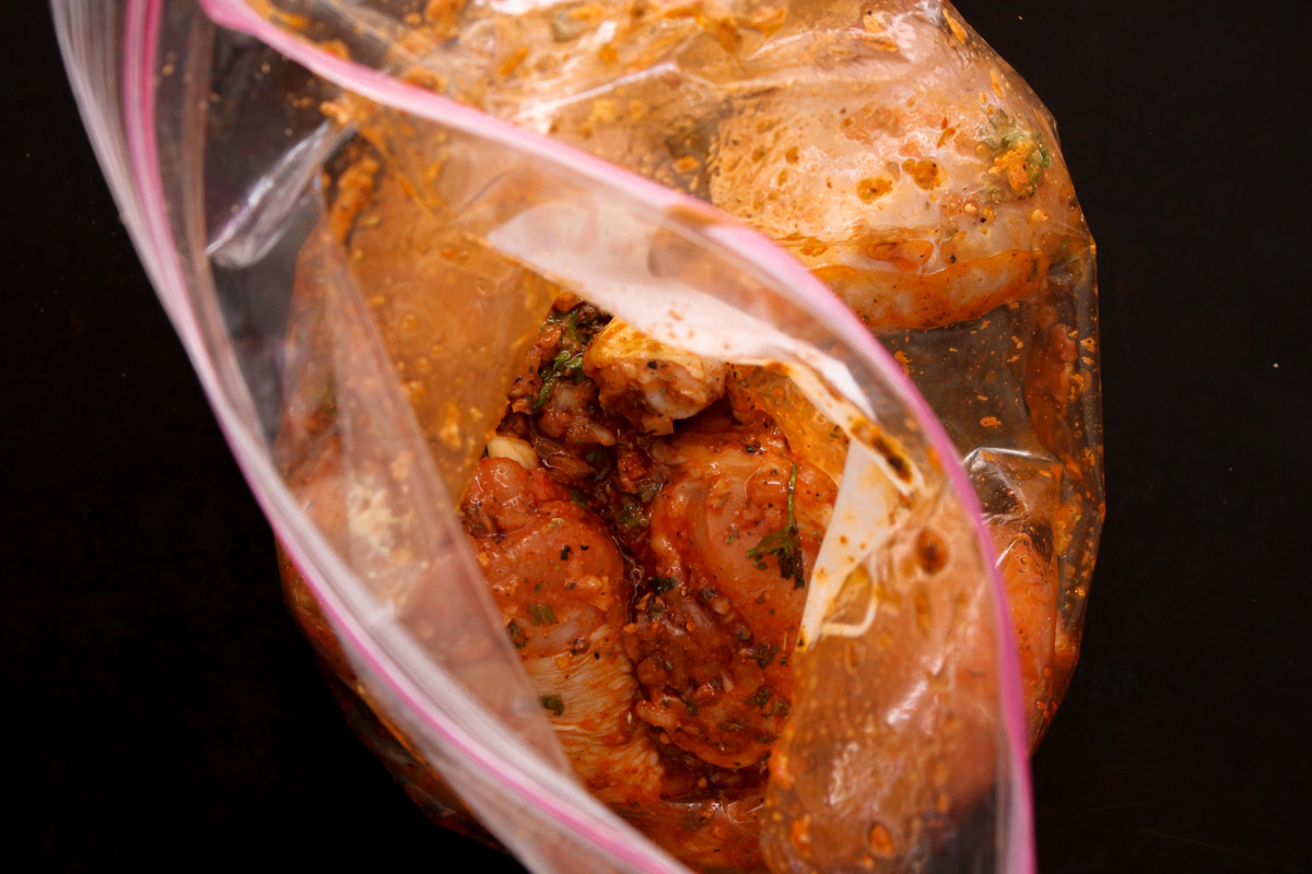 image of chicken legs in a zipped lock bag.