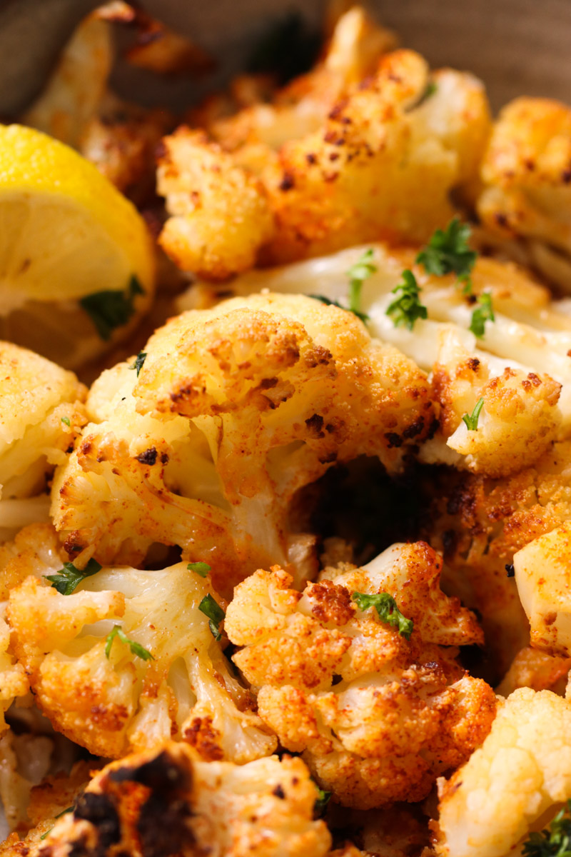 close up image of Easy Italian Roasted Cauliflower in a bowl. 