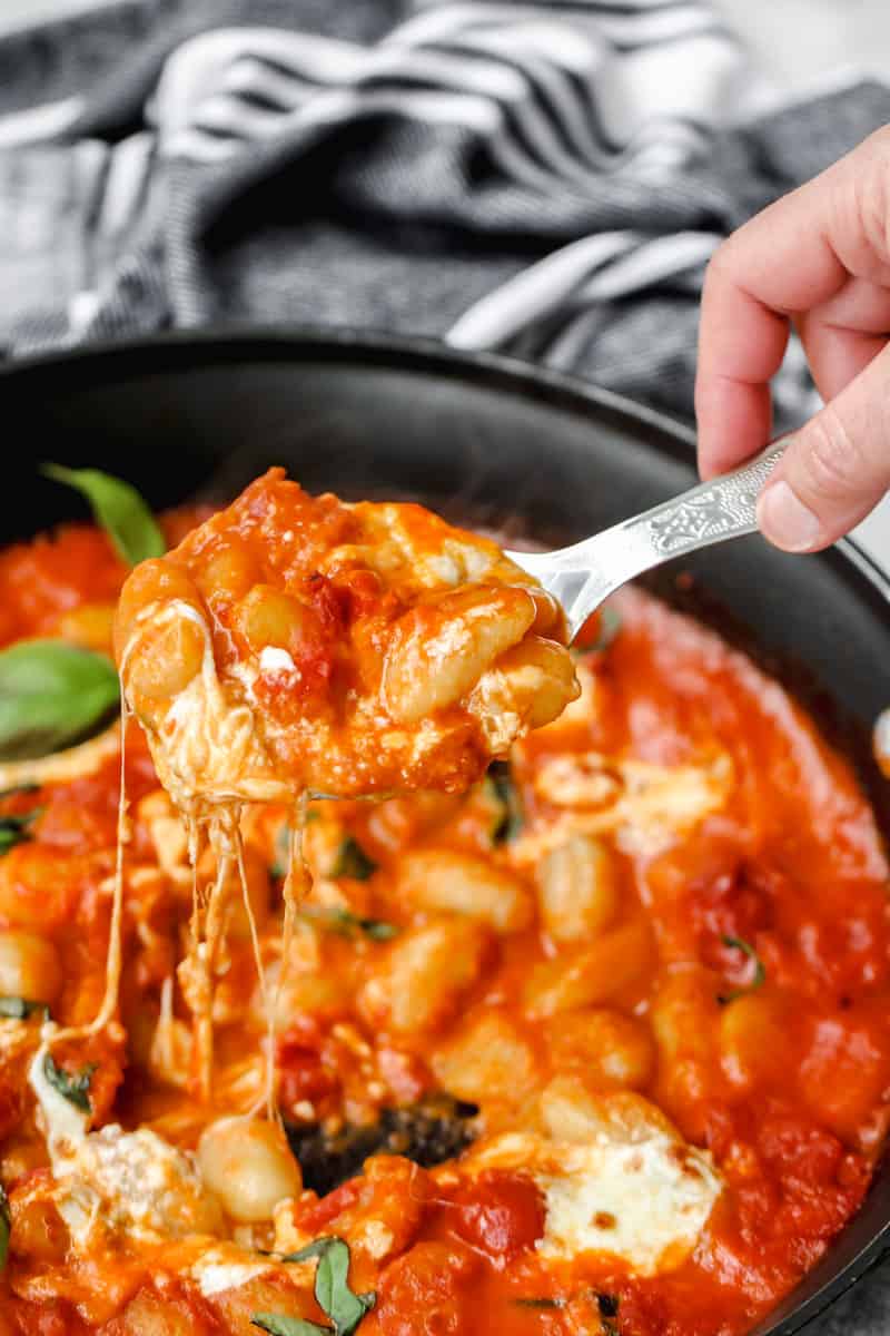 Gnocchi alla sorrentina being scooped.