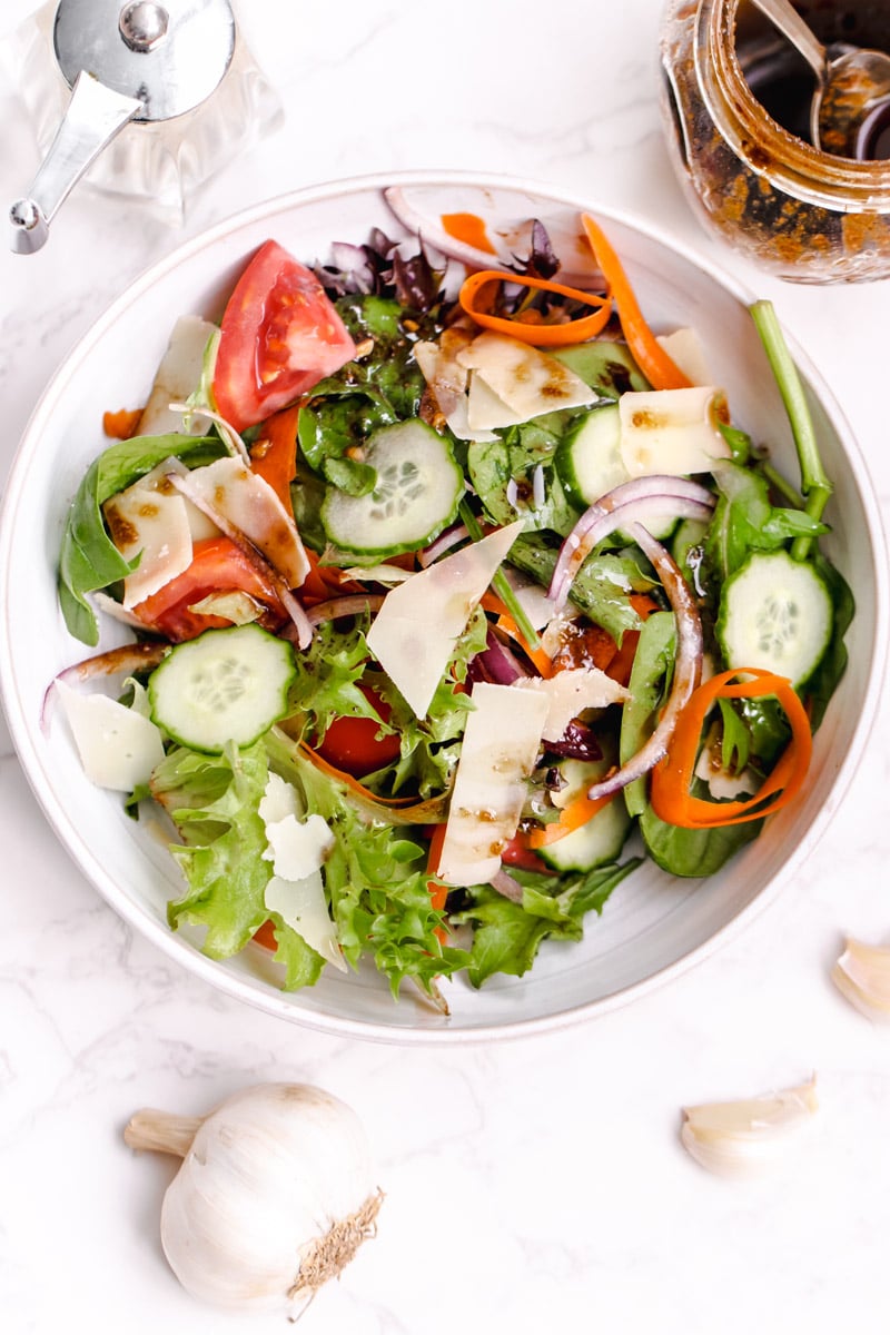 overhead image of insalata mista in a white bowl