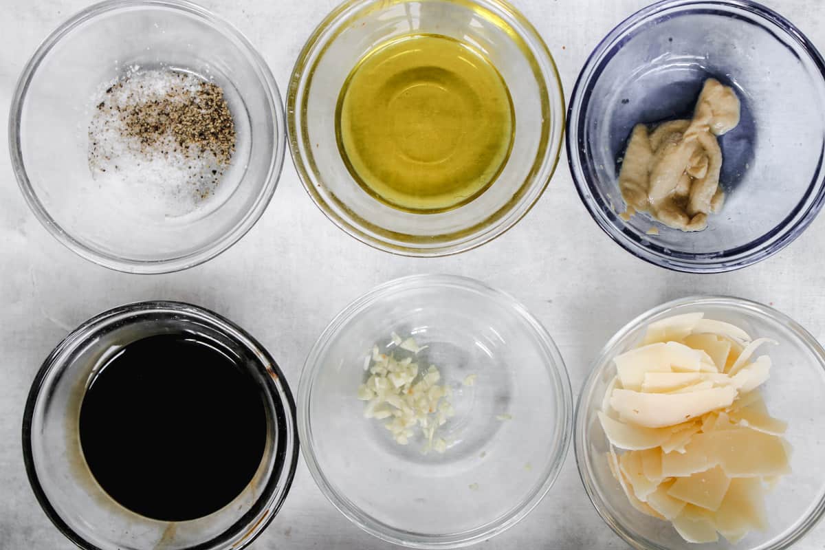 overhead image of ingredients to make a balsamic vinaigrette. 