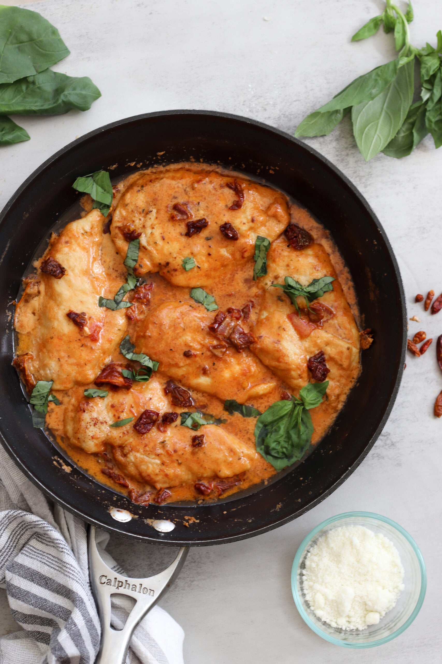 overhead image of marry me chicken in a skillet.