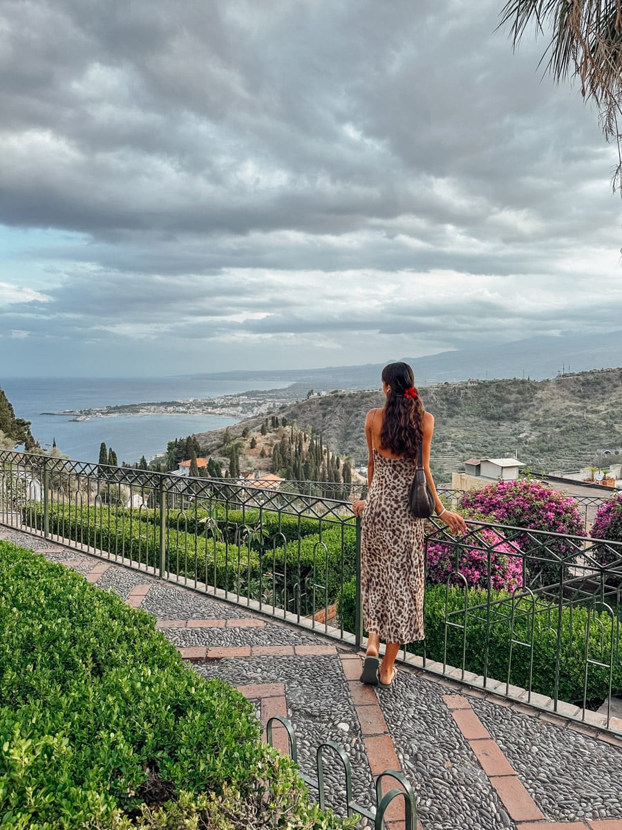 Girl looking out at Taormina.