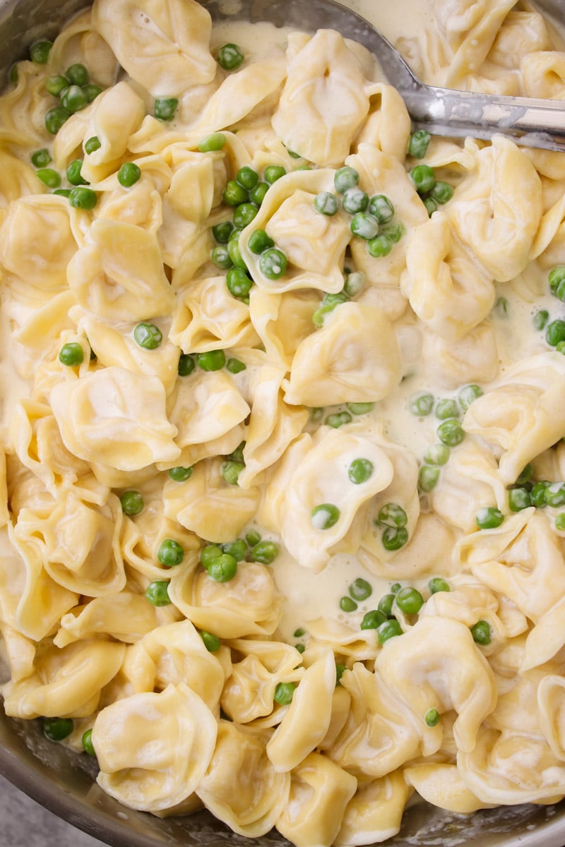 close up image of pasta with peas.