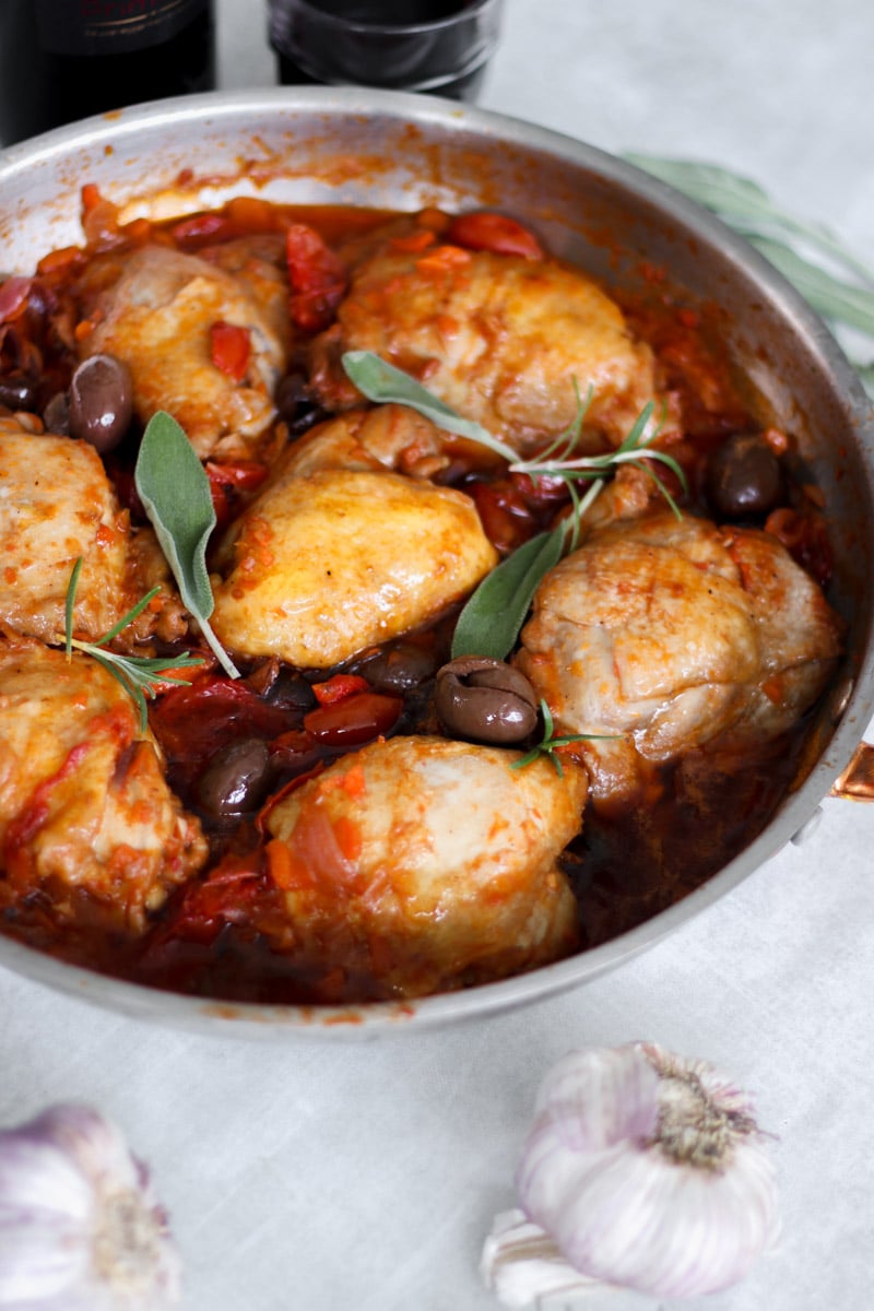 close-up image of chicken cacciatore in a skillet.