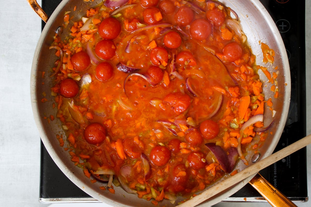 overhead image of cooking sauce in a skillet.