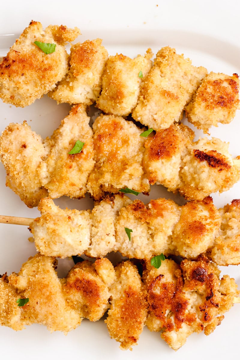 close up image of chicken spiedini on a plate.