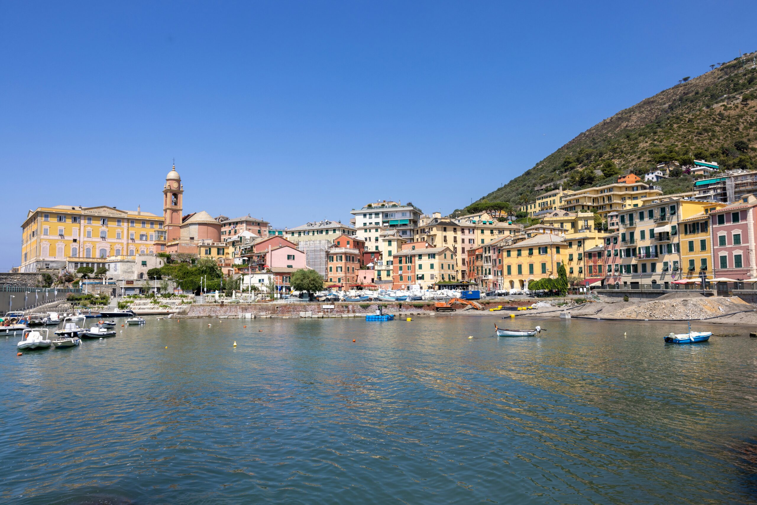 This photograph captures the stunning sea view from Nervi, a picturesque district in the Metropolitan City of Genoa, Italy. Overlooking the Ligurian Sea, the image showcases the rugged coastline with its rocky cliffs, vibrant Mediterranean greenery, and the crystal-clear blue waters. The serene atmosphere and natural beauty of Nervi make it a perfect representation of Genoa's coastal charm. If you're wondering "is Genoa worth visiting?" this breathtaking sea view from Nervi highlights why the city is an ideal destination for those seeking scenic landscapes and tranquil seaside escapes.