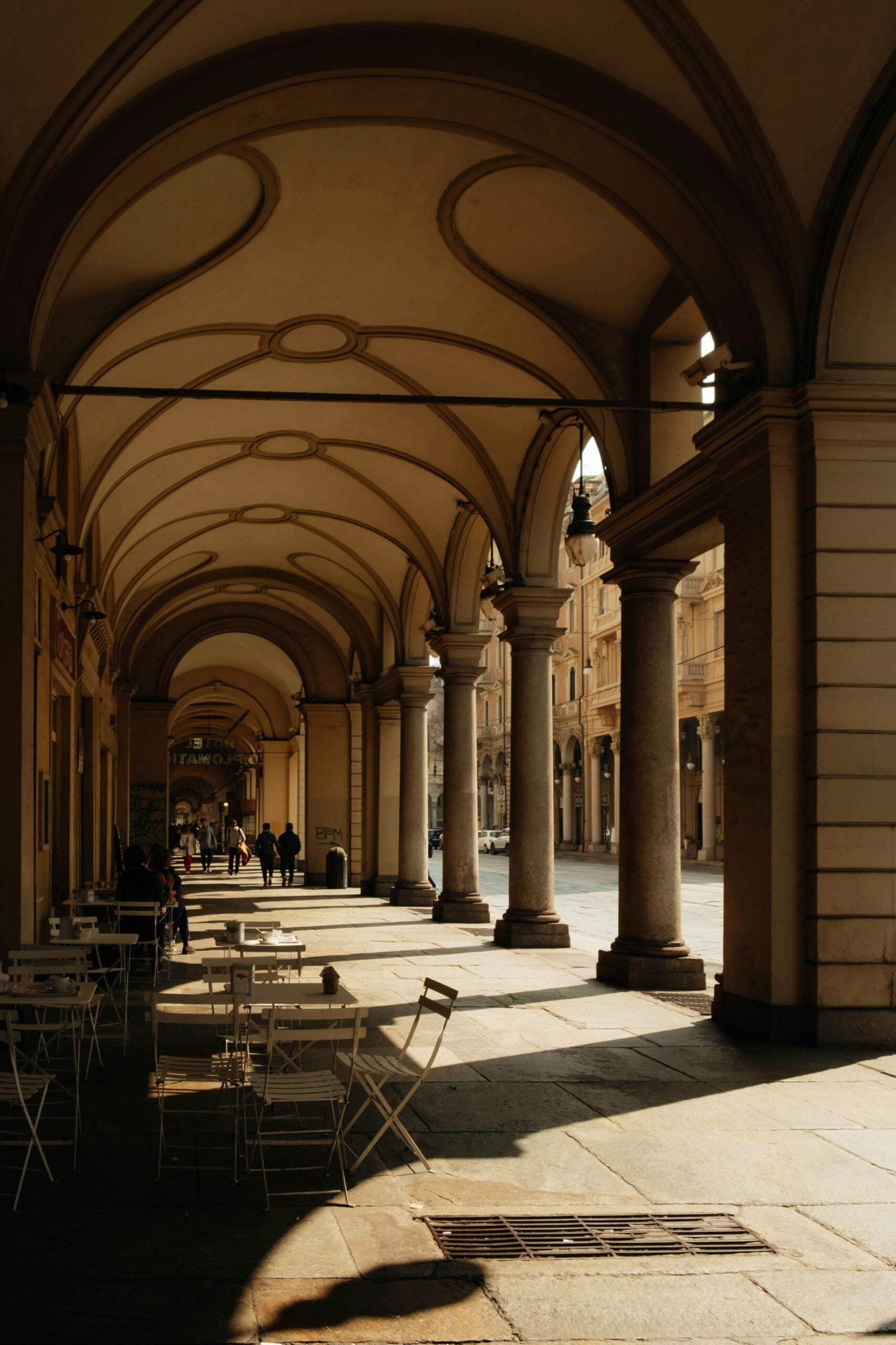 A charming Baroque architecture portico in Turin showcases intricate design and elegant details. The grand archways, adorned with ornate carvings and decorative motifs, reflect the city's rich historical and cultural heritage. Is Turin worth visiting? Absolutely! This stunning example of Baroque architecture highlights the artistic beauty and sophistication that make Turin a captivating destination for architecture enthusiasts and history lovers alike.