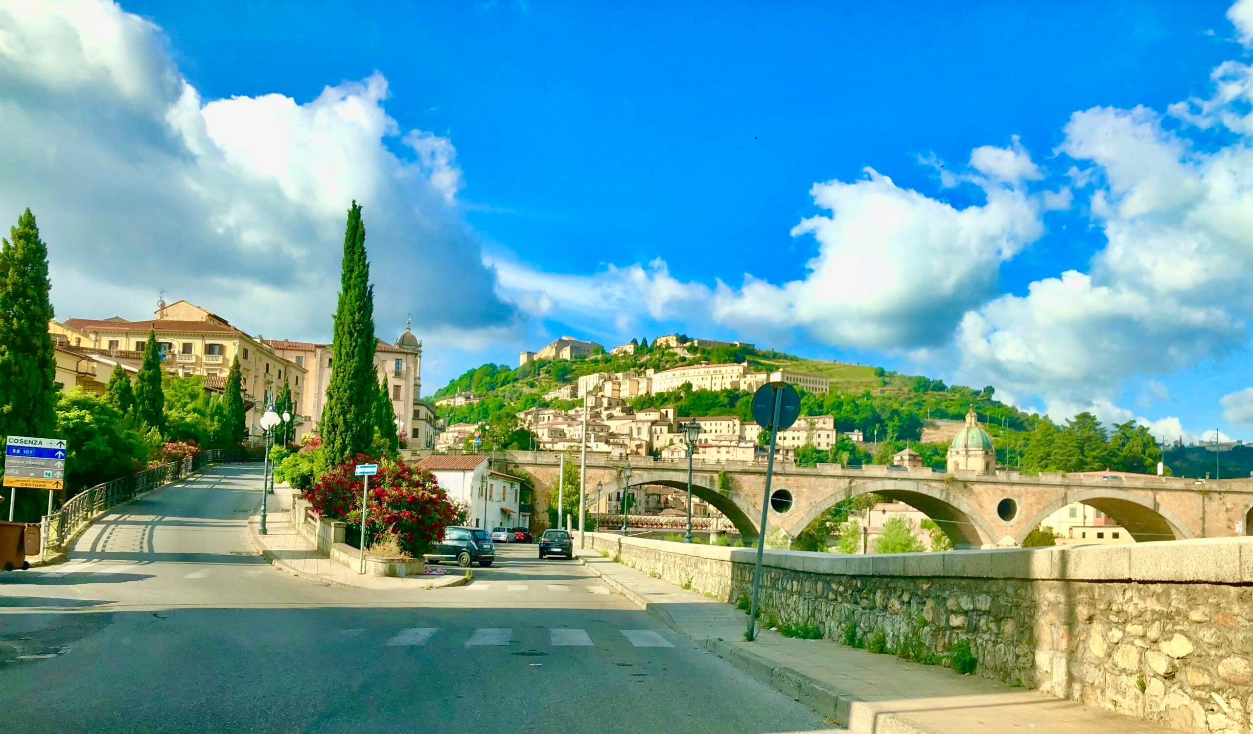The clouds rest gently above the bridge in Cosenza, Italy, creating a serene and picturesque scene. The bridge, a key landmark in the city, stretches across the Serre River, connecting the historic old town with the newer areas. The soft clouds add a touch of tranquility to the landscape, enhancing the charm of Cosenza's urban and natural beauty. This peaceful moment captures the essence of this Calabrian city, where history and nature coexist harmoniously.