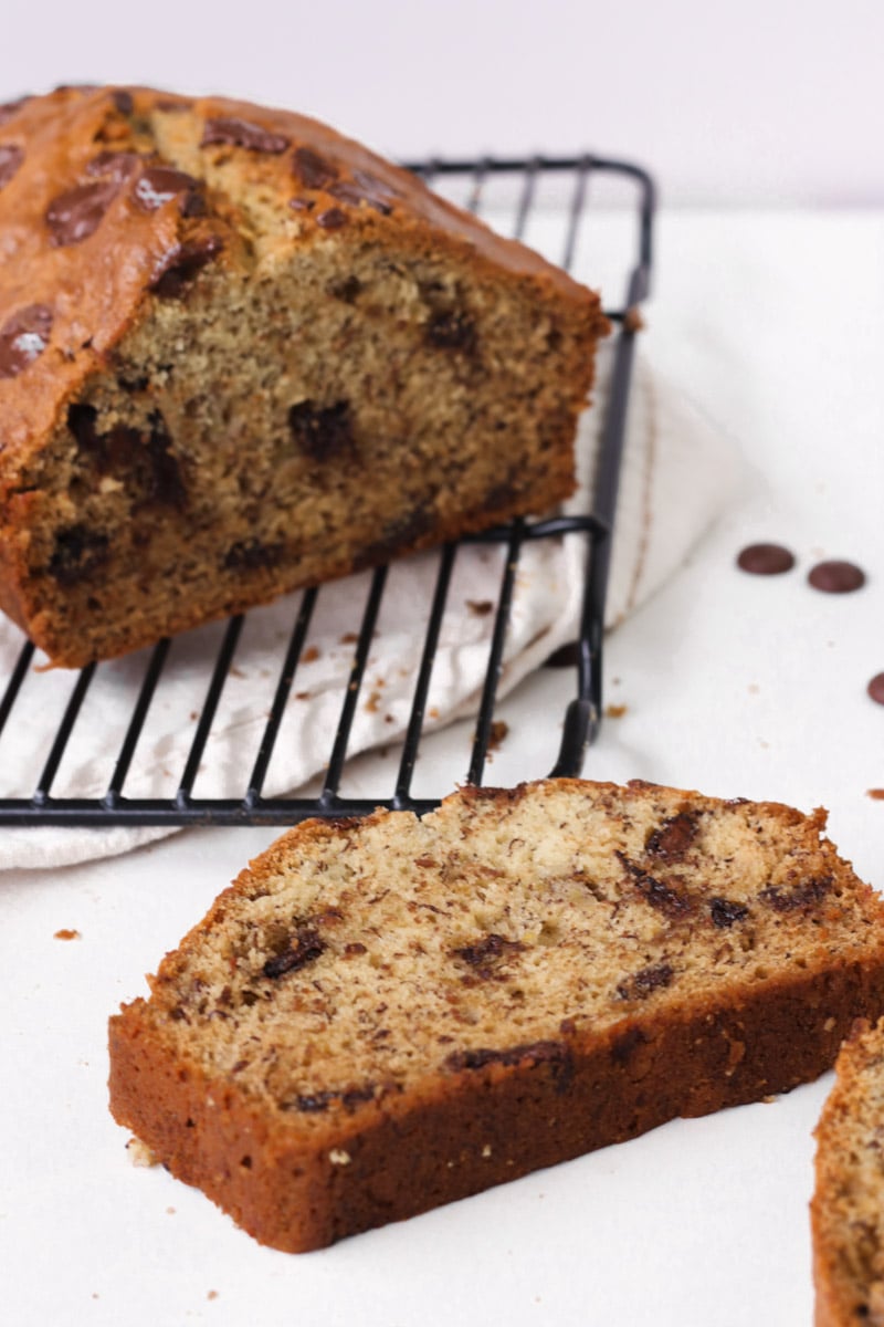 close up image of sliced banana bread with chocolate chips.