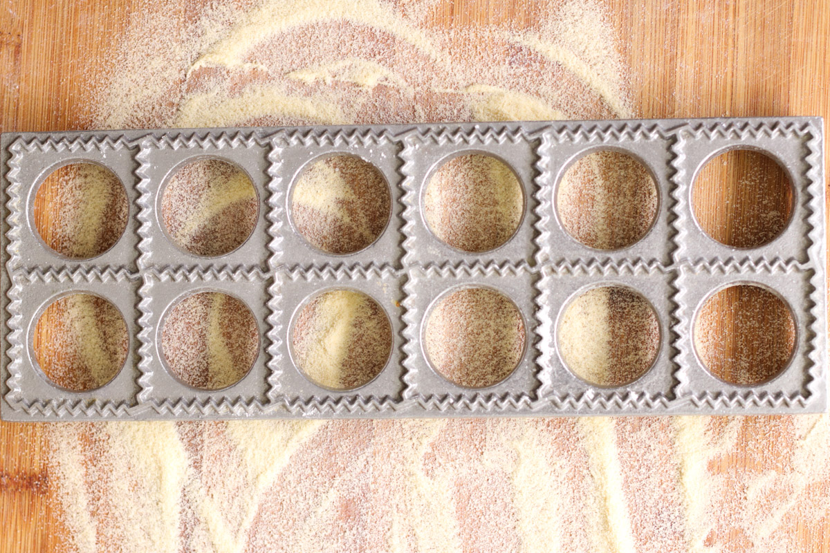 close up image of a ravioli stamp.