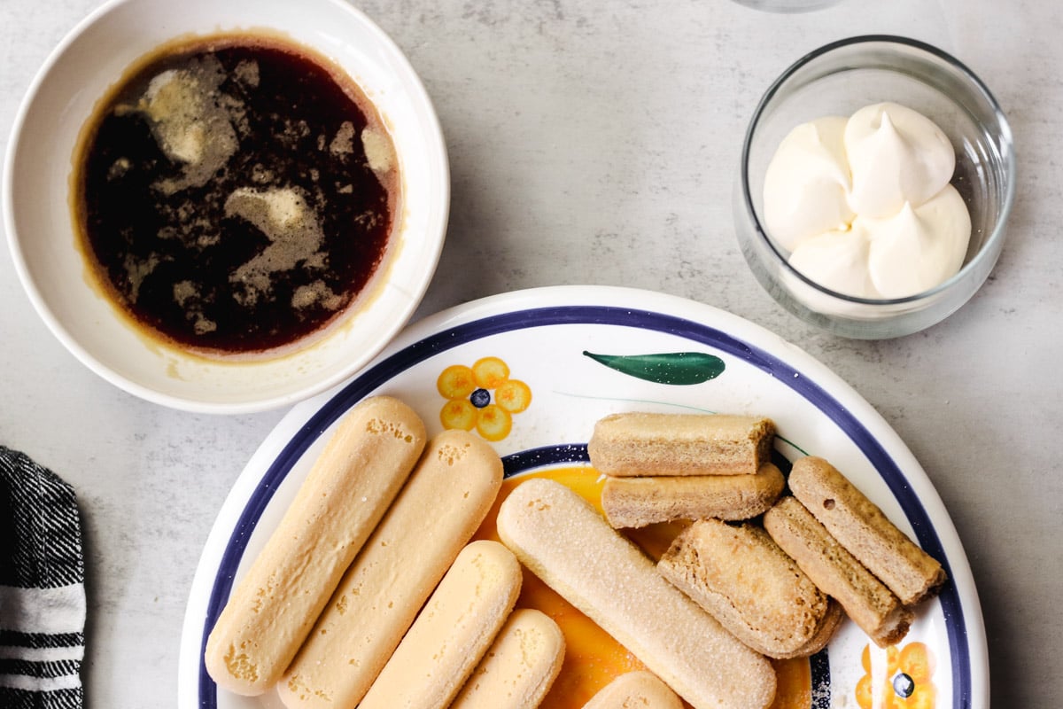 overhead image of ingredients for making Tiramisu recipe step by step.
