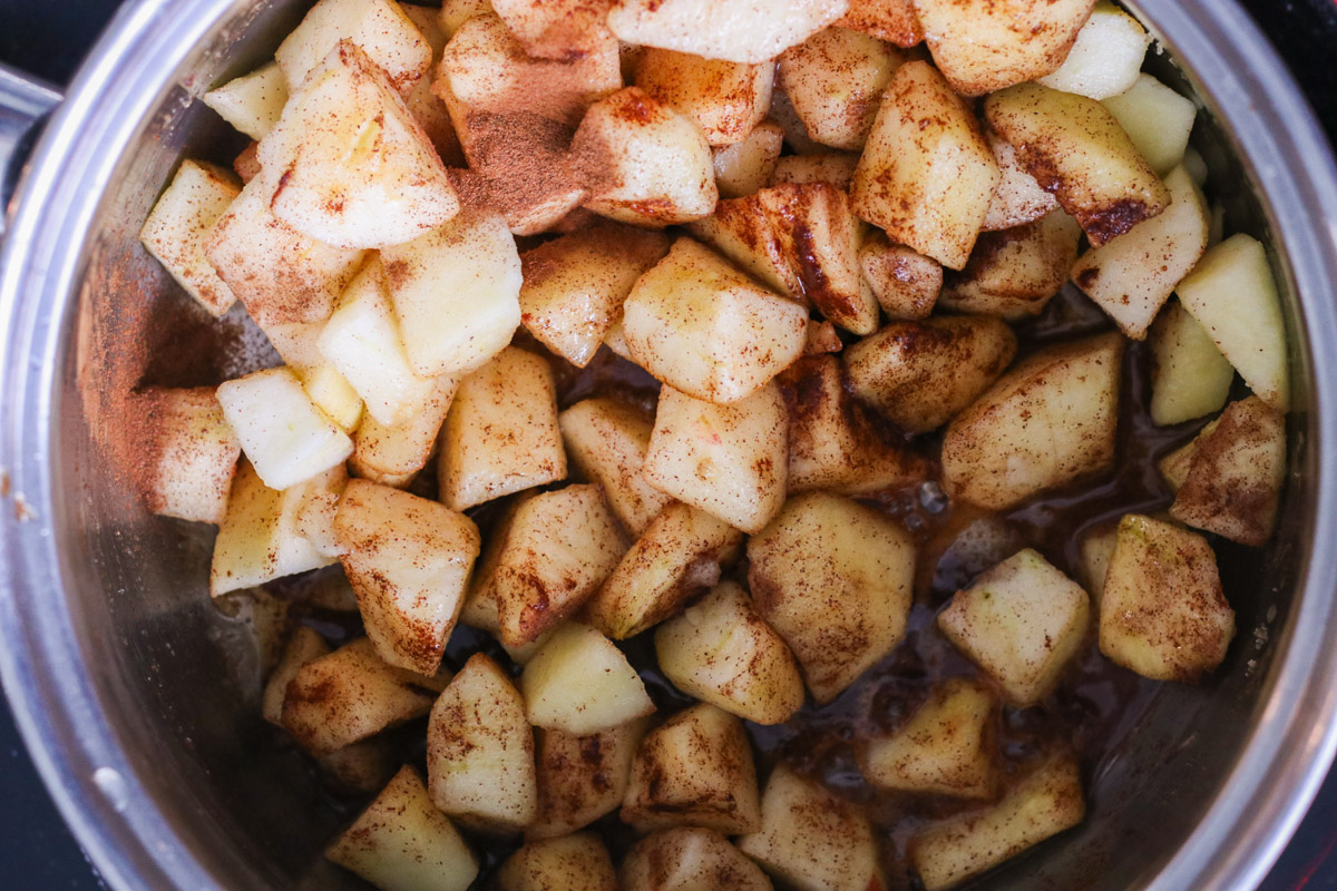 close up image of cooking apple compote.