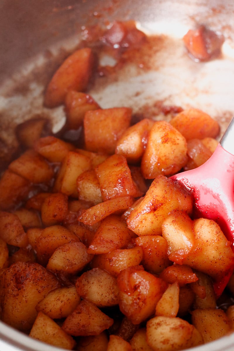 close up image of cooking apple compote.