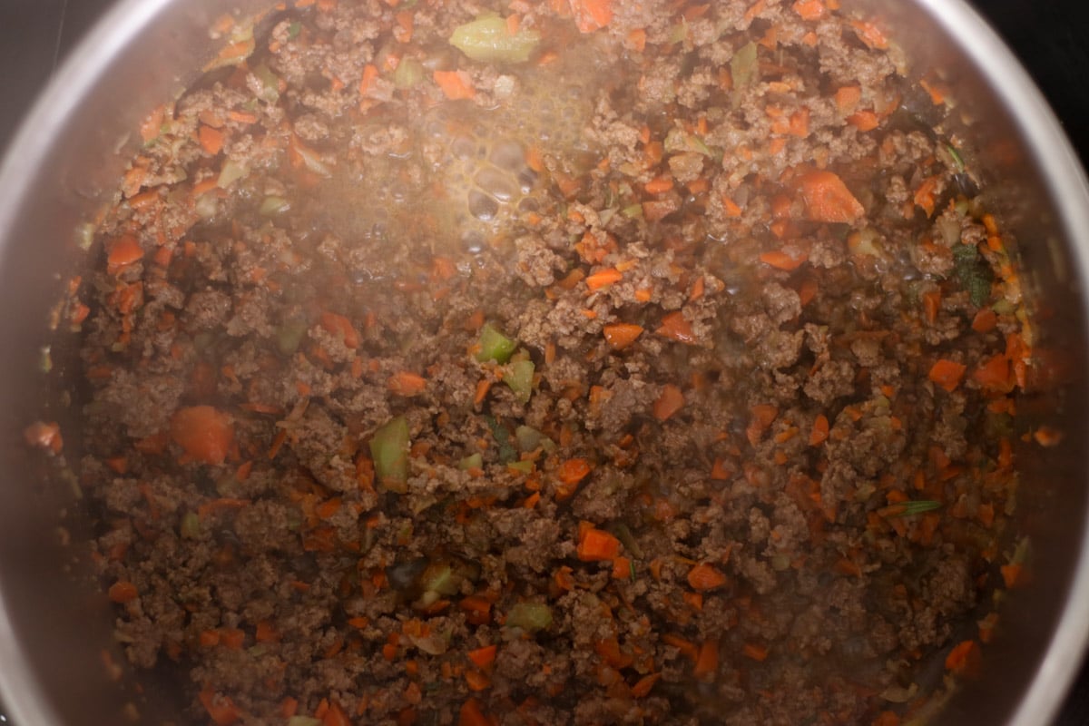 Close up image of making authentic Bolognese sauce recipe.